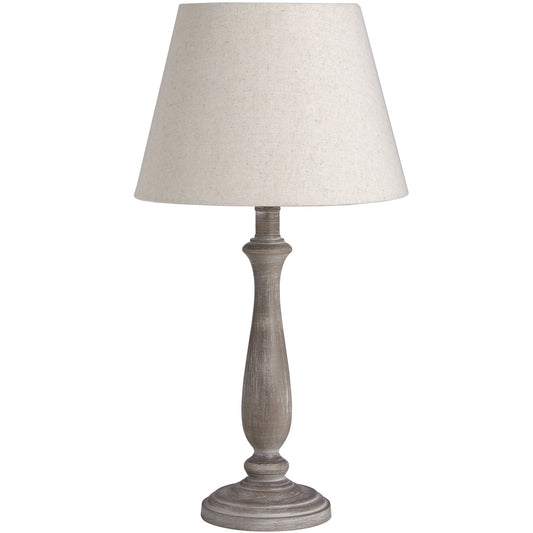 Theos Table Lamp is a handcrafted, simple, and elegant table lamp with linen shade.