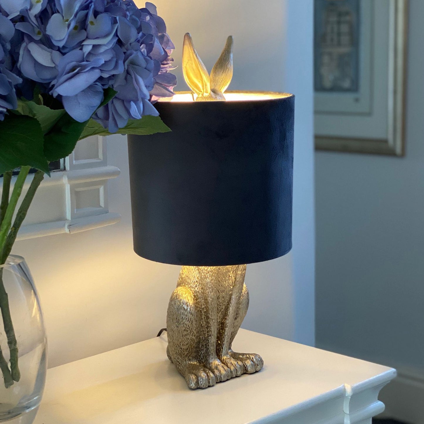 Silver Hare Table Lamp. An extraordinary design with a brushed nickel effect base with a grey velvet shade.