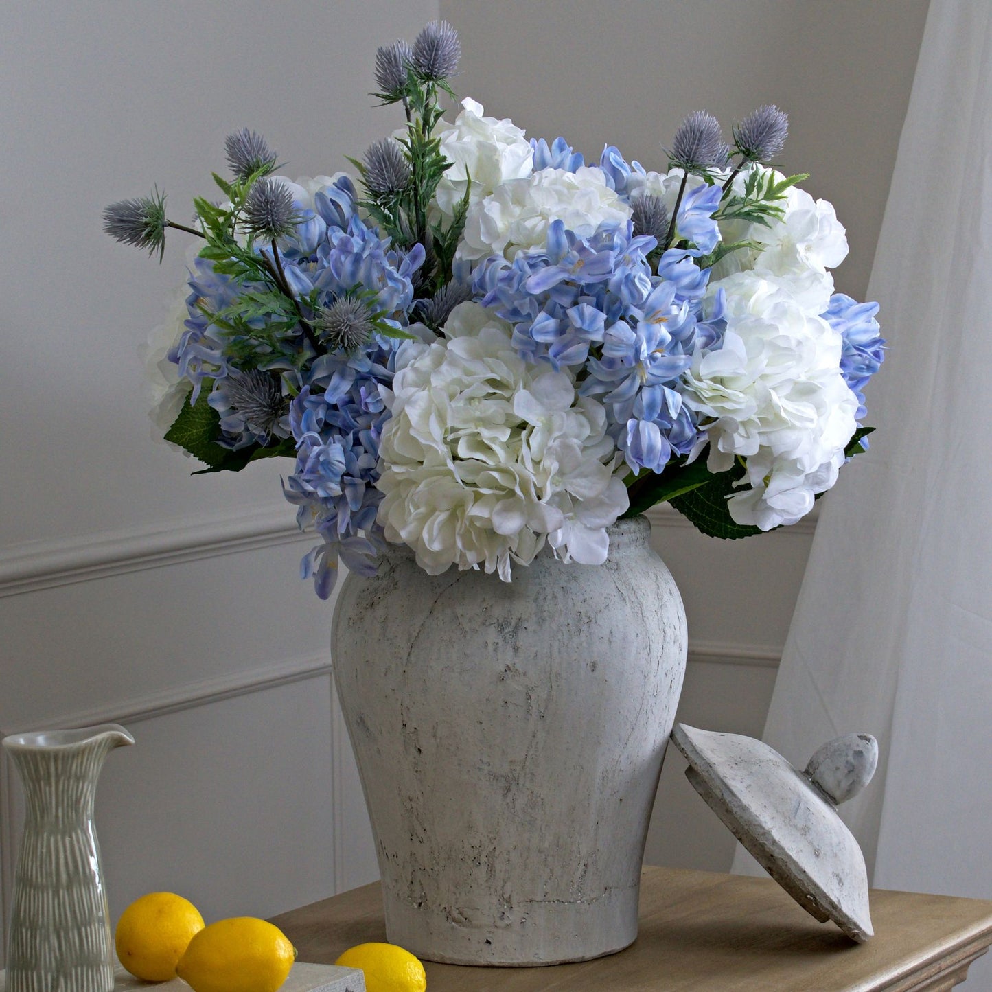 Bloomville Handcrafted Stone Ginger Jar with lid.