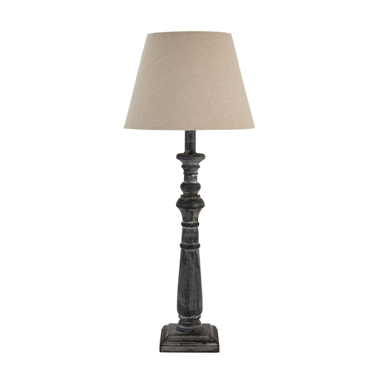 Inca Column Table Lamp is an elegant table lamp complete with a simple, neutral linen shade.