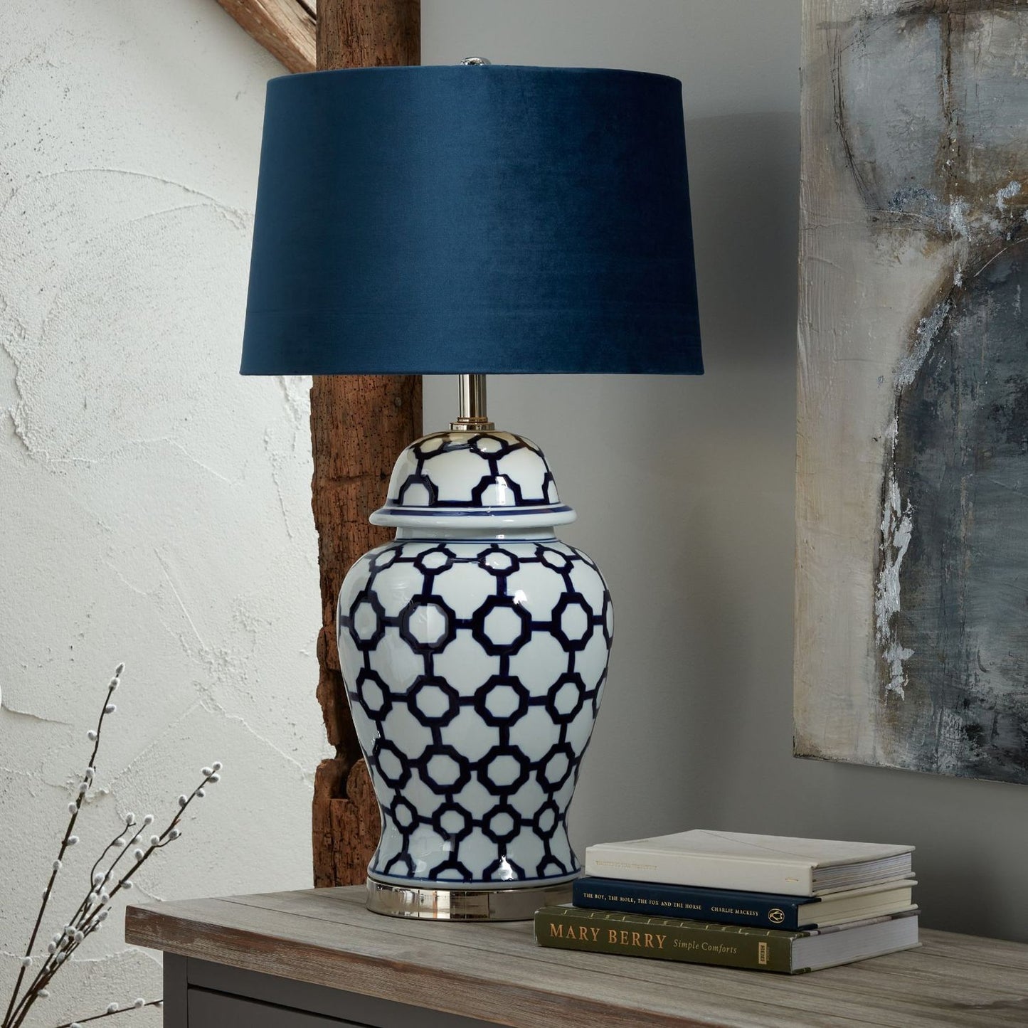 Icanthus Blue And White Handcrafted Ceramic Lamp in traditional ginger jar-shaped design with blue velvet shade.